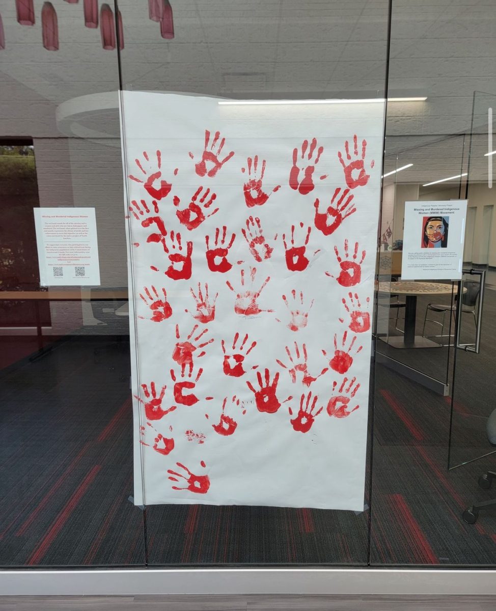 Owens Campus made a banners of red handprints to advocate for Missing and Murdered Indigenous Women the week of October 12. This banner can be seen outside of the Owens Toledo-area Campus Library.