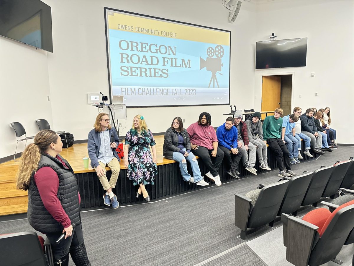 Jen Hazel (left) listens to responses from participating team members during the ORFS-Film Challenge Fall 2023 screening.
