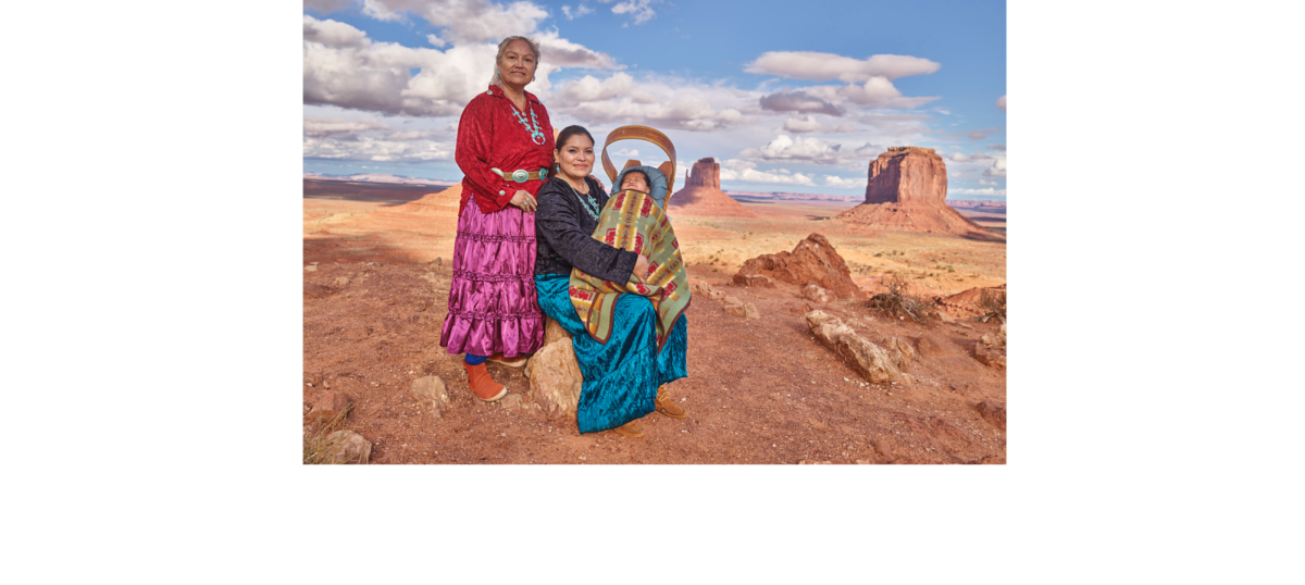 Navajos Loretta Yazzie, Eula M. Atene, and 3-month old boy Leon Clark pose in Monument Valley Navajo Tribal Park, a red-sand desert wonderland on the Arizona-Utah border. 

Retrived from Photographs in the Carol M. Highsmith Archive, Library of Congress, Prints and Photographs Division.