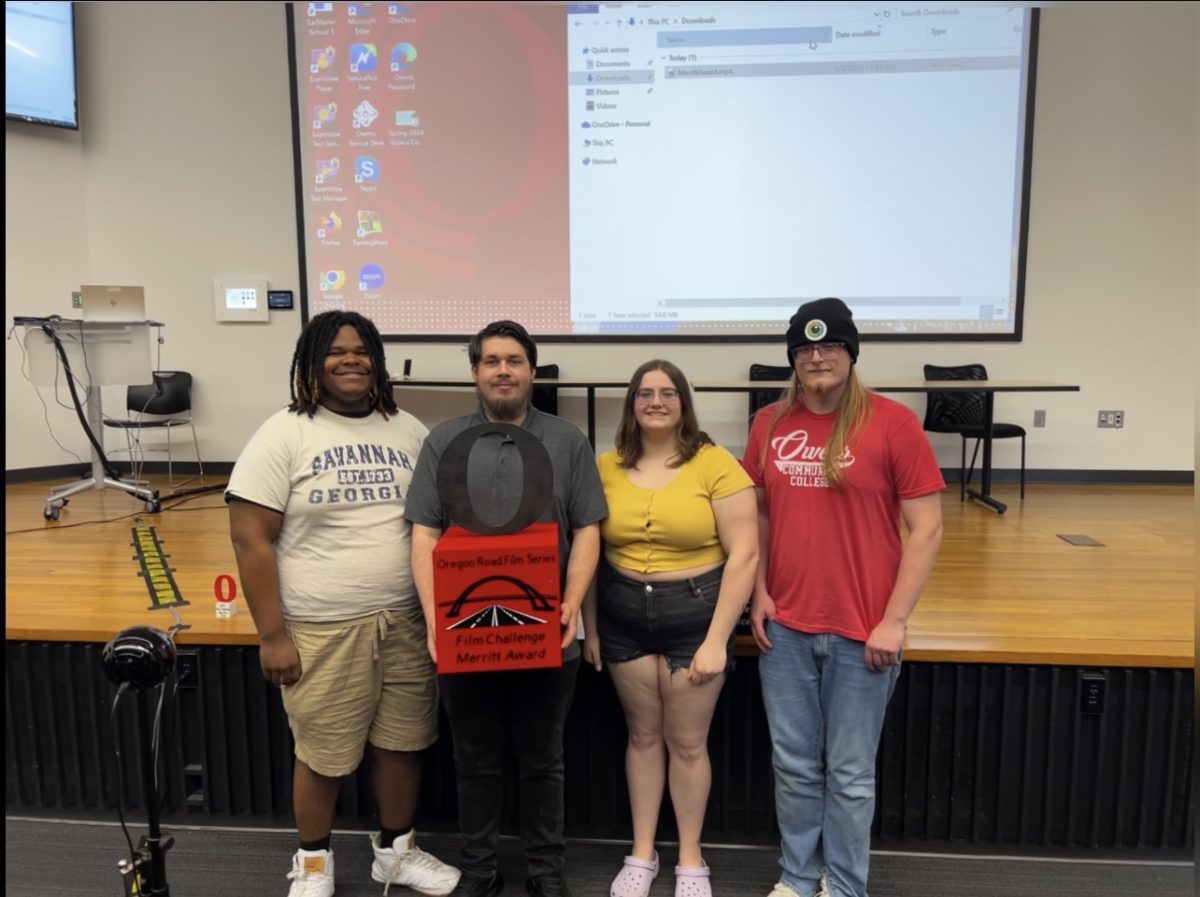 Cheesy Productions Team receiving their Judges Choice Award for Slushie The Musical. Team members in picture from left to right Justin Donaldson, Russell Gronbach, Hailey Creps, and Adam Maenle.