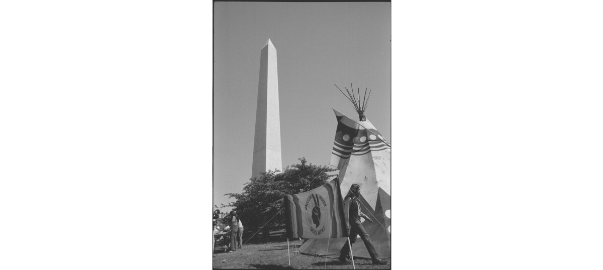 Tipi with sign American Indian Movement on the grounds of the Washington Monument, Washington, D.C., during the Longest walk. Retrieved from the Library of Congress Prints and Photographs Division.