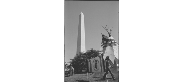 Tipi with sign American Indian Movement on the grounds of the Washington Monument, Washington, D.C., during the Longest walk. Retrieved from the Library of Congress Prints and Photographs Division.