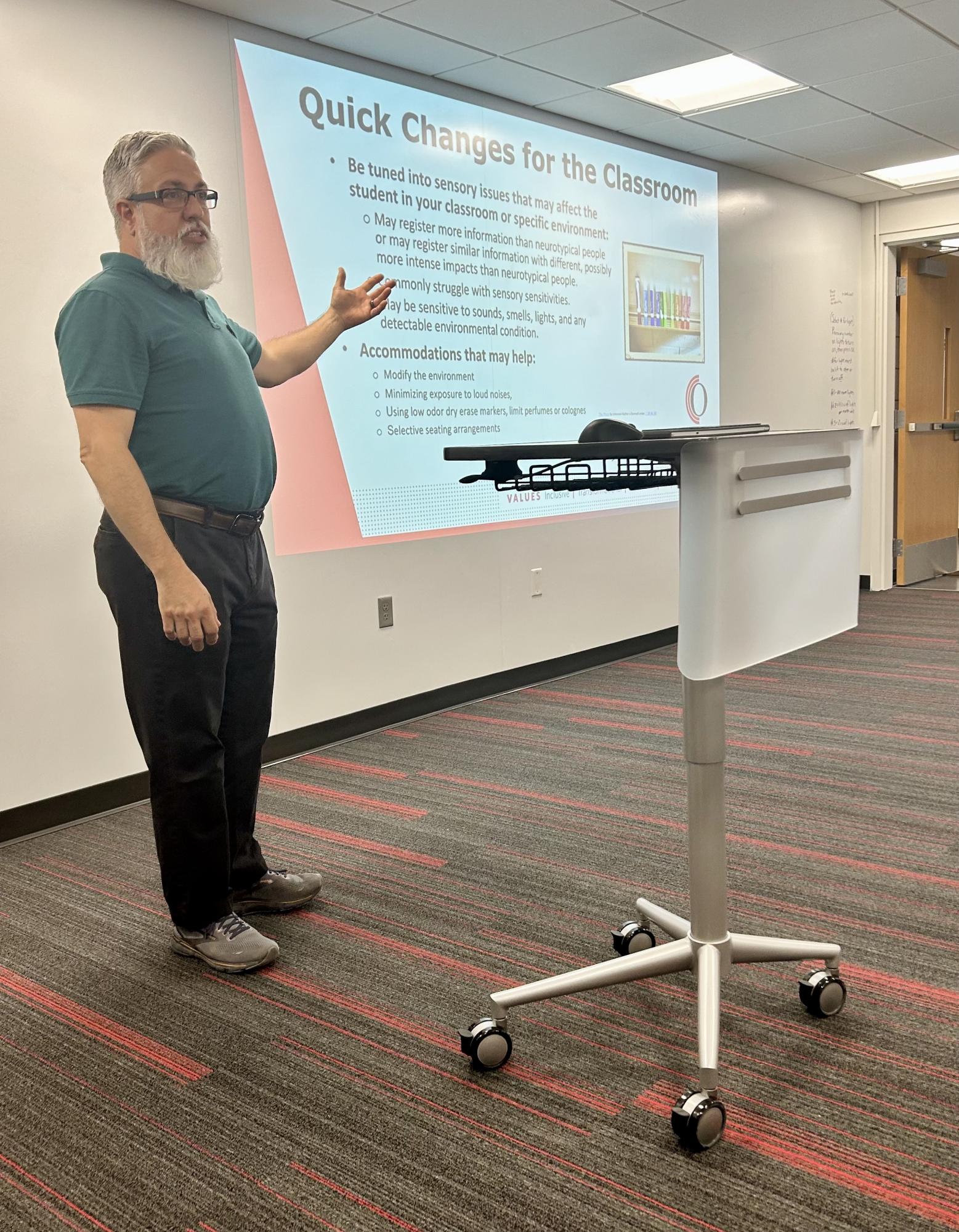 Chris Hendricks, Direct of the Disability Resources Center at Owens Community College, presenting on Neurodivergent Friendly Classrooms before the start of the Fall 2024 semester. 