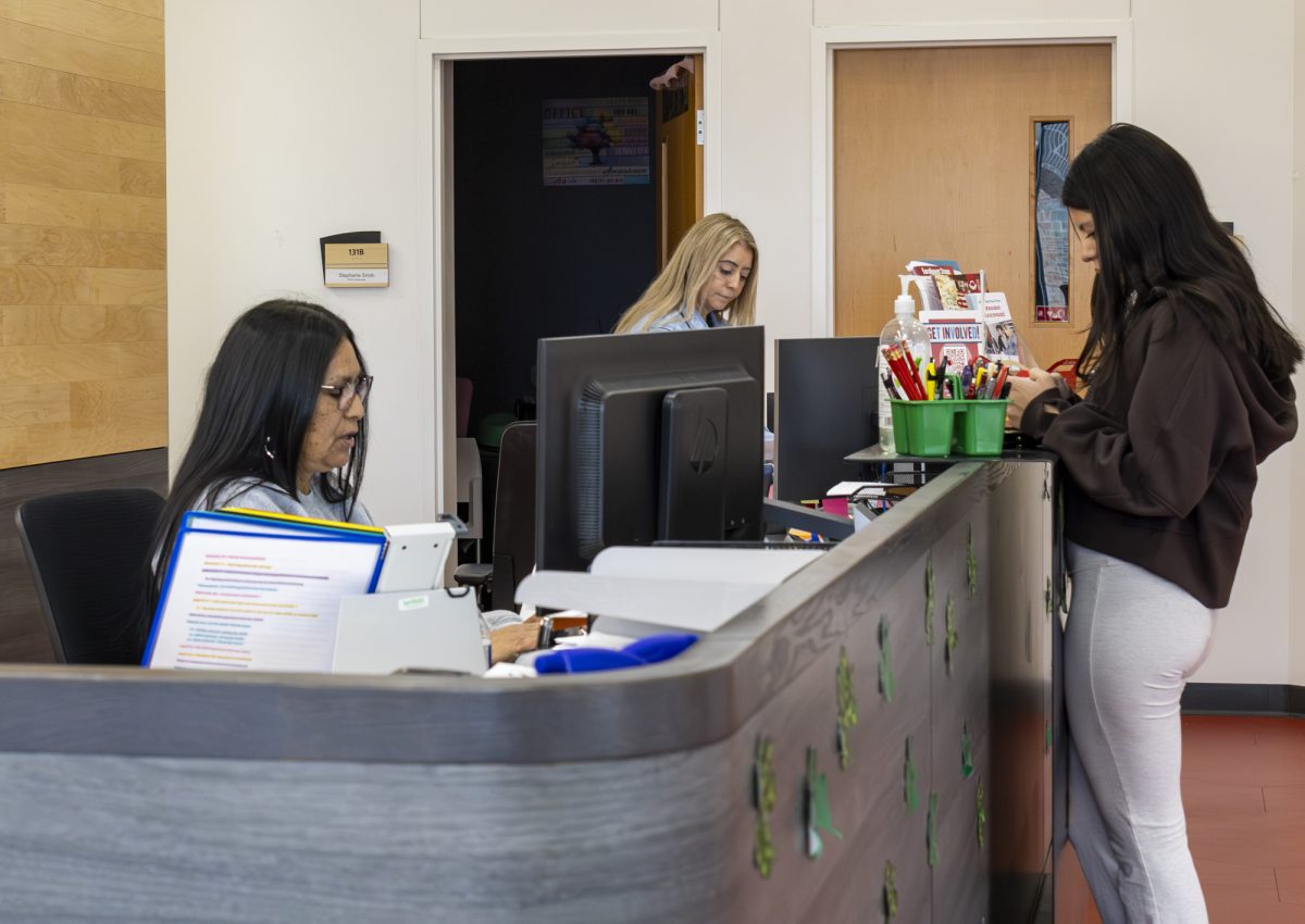 Front desk action at Student Services in College Hall, where Career and Transfer Services is located.