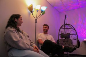 Two social work students checking out the Multi-Sensory Room in CH after BIG Read Book Club last semester.