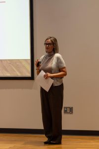 Dr. Kristin Price presenting at Confronting Biases on September 4, 2025.