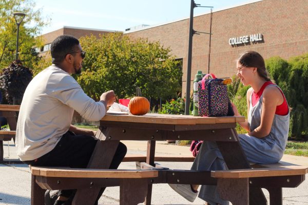 DJ Evans (Left) and Elise Pagal (Right) enjoying painting pumpkins.