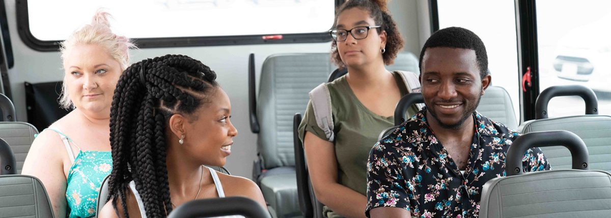 Students on the Owens Shuttle enjoying the ride. (Owens Marketing)